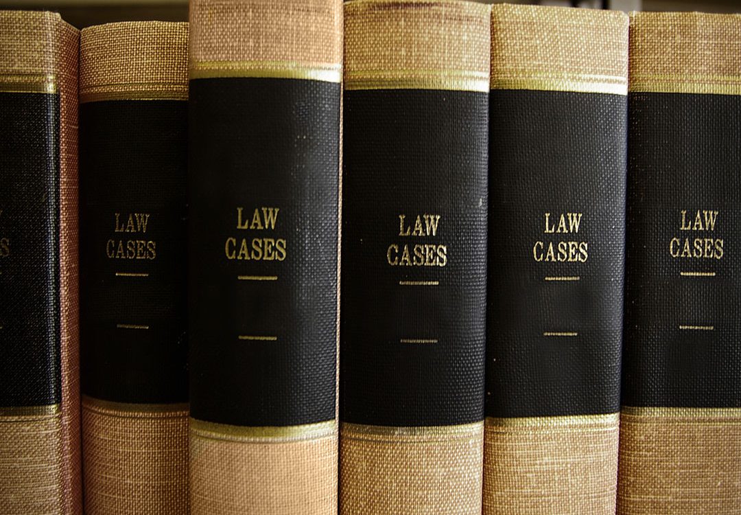 Row of book binds that say "Law Cases"